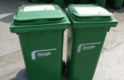 Two garden waste green bins.