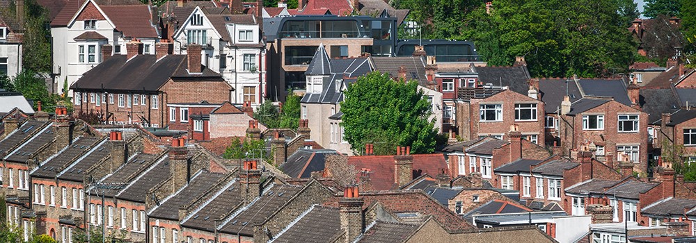 High angle view of houses across some streets.